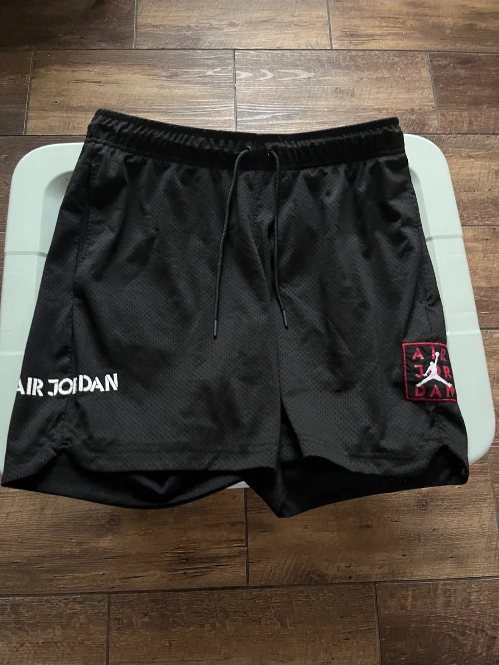 Jordan Men’s Black Athletic Mesh Shorts with Red Accent Patch